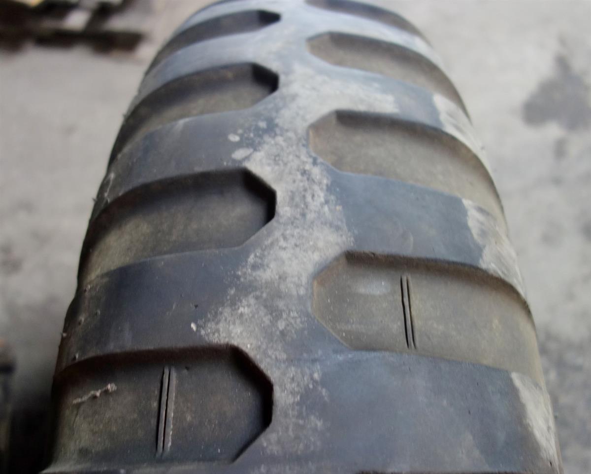 TI-169 | TI-169  Military Tread Tire 11.00x20 Mounted on 10 Hole Budd Wheel (Lot Sale) USED) (1).JPG