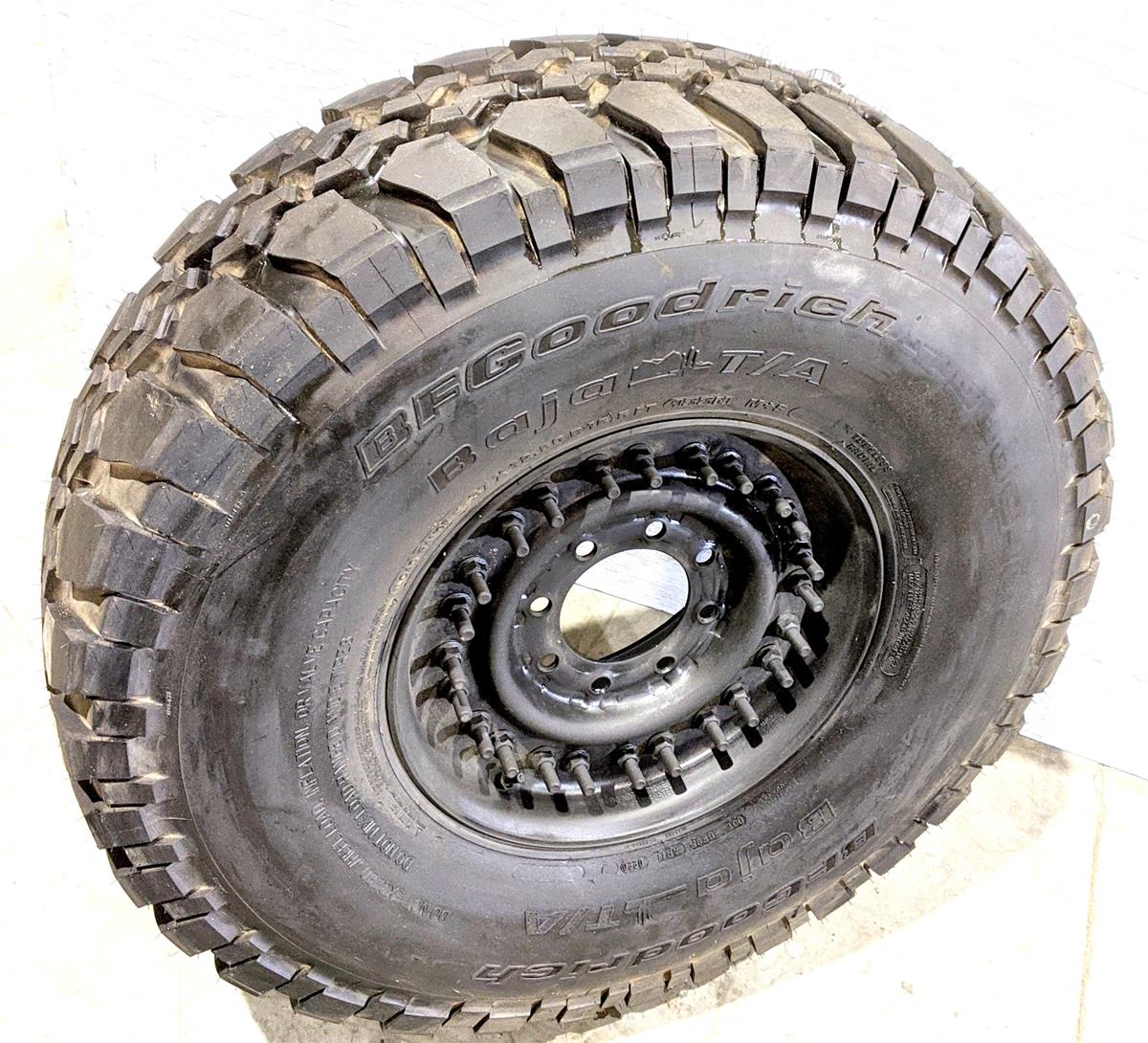 TI-1833 | TI-1833 BF Goodrich Baja TA 37X12.50R16.5LT Tire Mounted on 24 Bolt Rim 100 Tread HMMWV (14).jpg