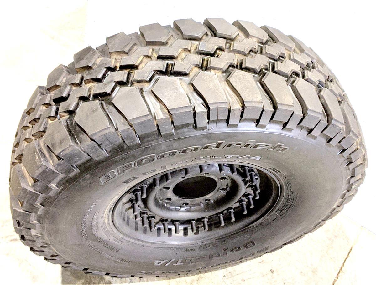 TI-1833 | TI-1833 BF Goodrich Baja TA 37X12.50R16.5LT Tire Mounted on 24 Bolt Rim 100 Tread HMMWV (16).jpg