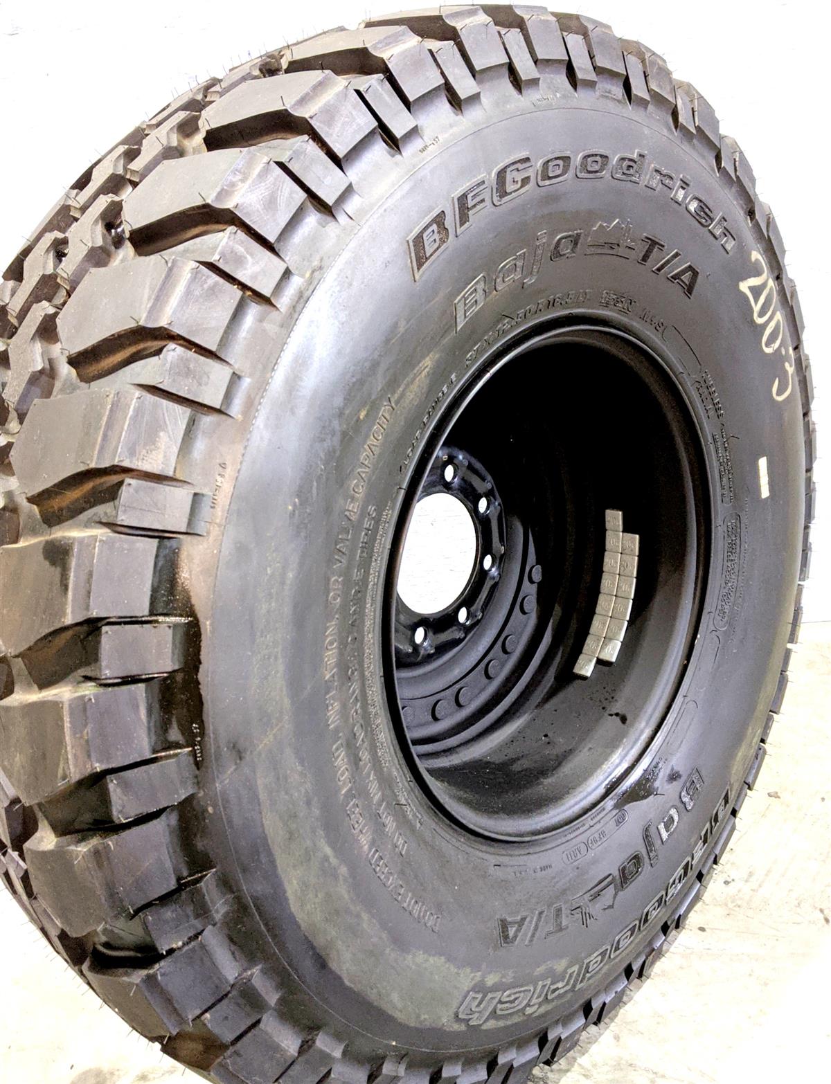 TI-1833 | TI-1833 BF Goodrich Baja TA 37X12.50R16.5LT Tire Mounted on 24 Bolt Rim 100 Tread HMMWV (23).jpg