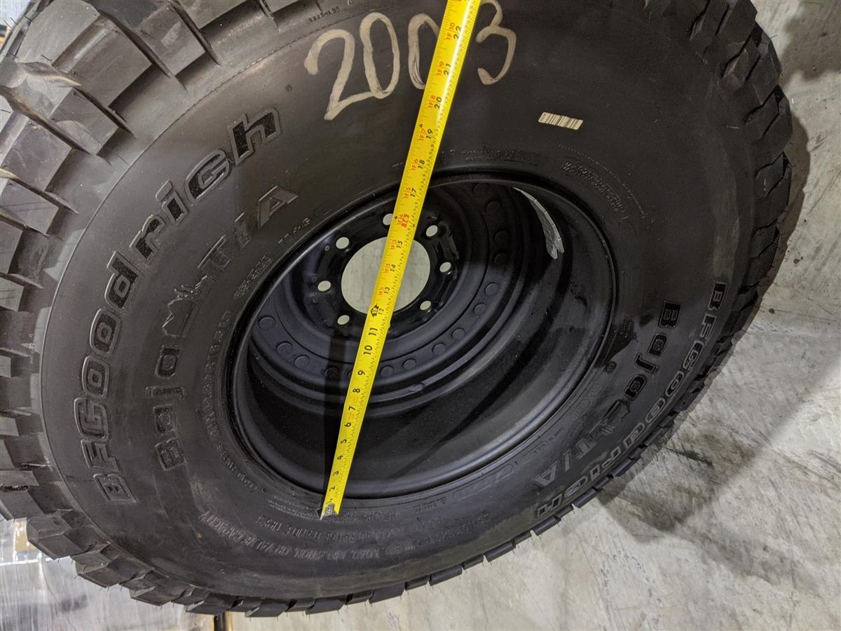 TI-1833 | TI-1833 BF Goodrich Baja TA 37X12.50R16.5LT Tire Mounted on 24 Bolt Rim 100 Tread HMMWV (28).jpg