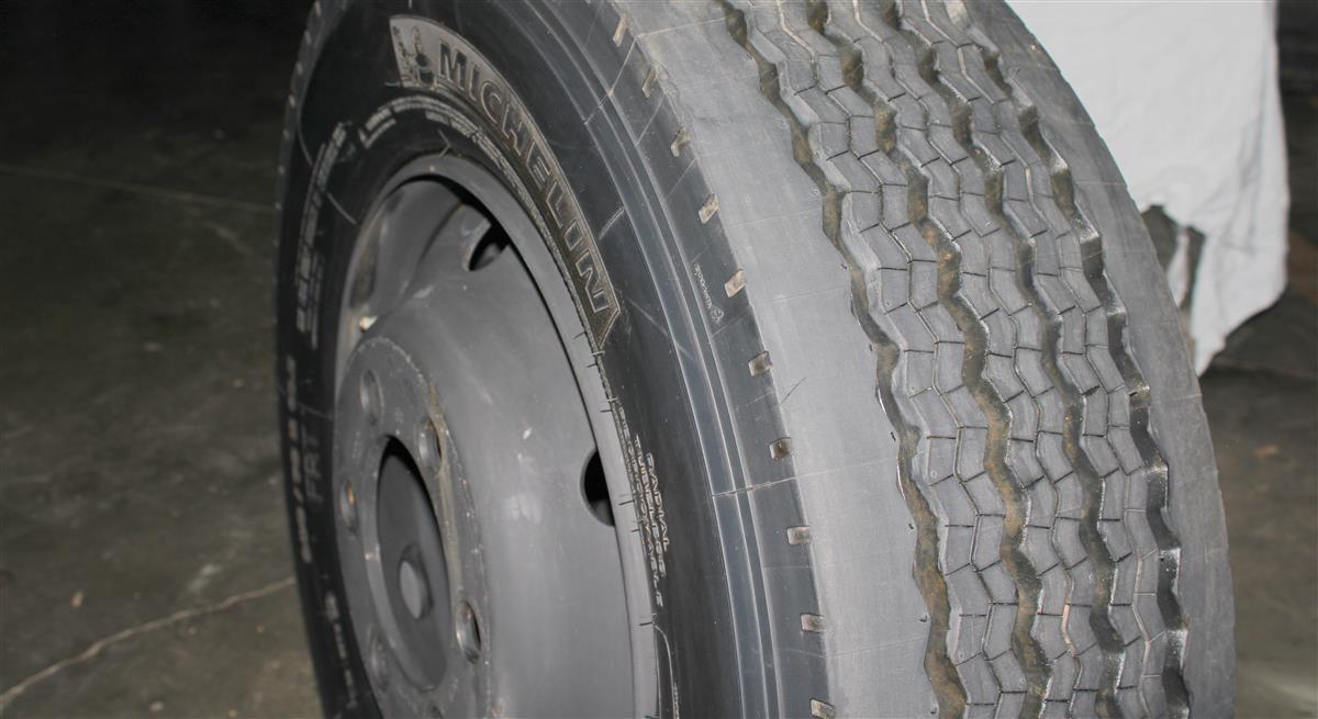 TI-1844 | TI-1844 Michelin XTE 2 285-70R19.5 with 6 Lug Budd Style Rim 100% Tread  (18).JPG